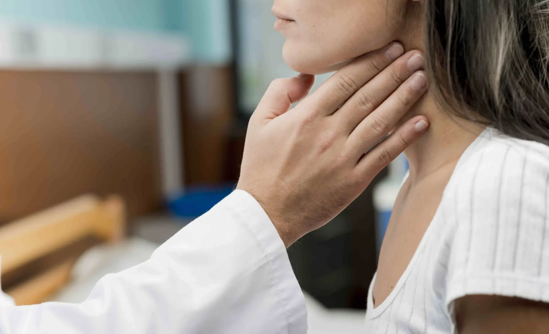 hand-touching-throat-patient2